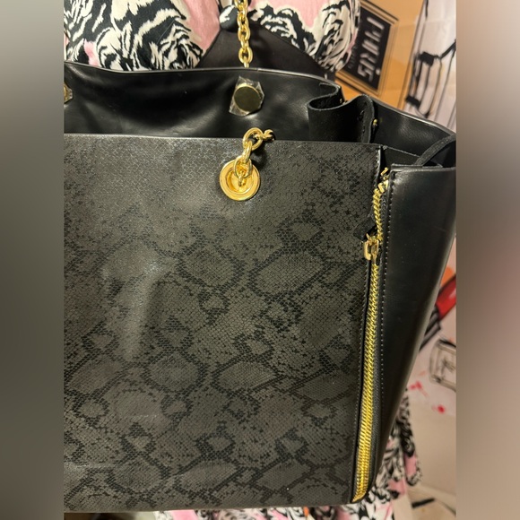 Like new Bebe black snack print tote/ shoulder bag with gold chain straps - Picture 9 of 14